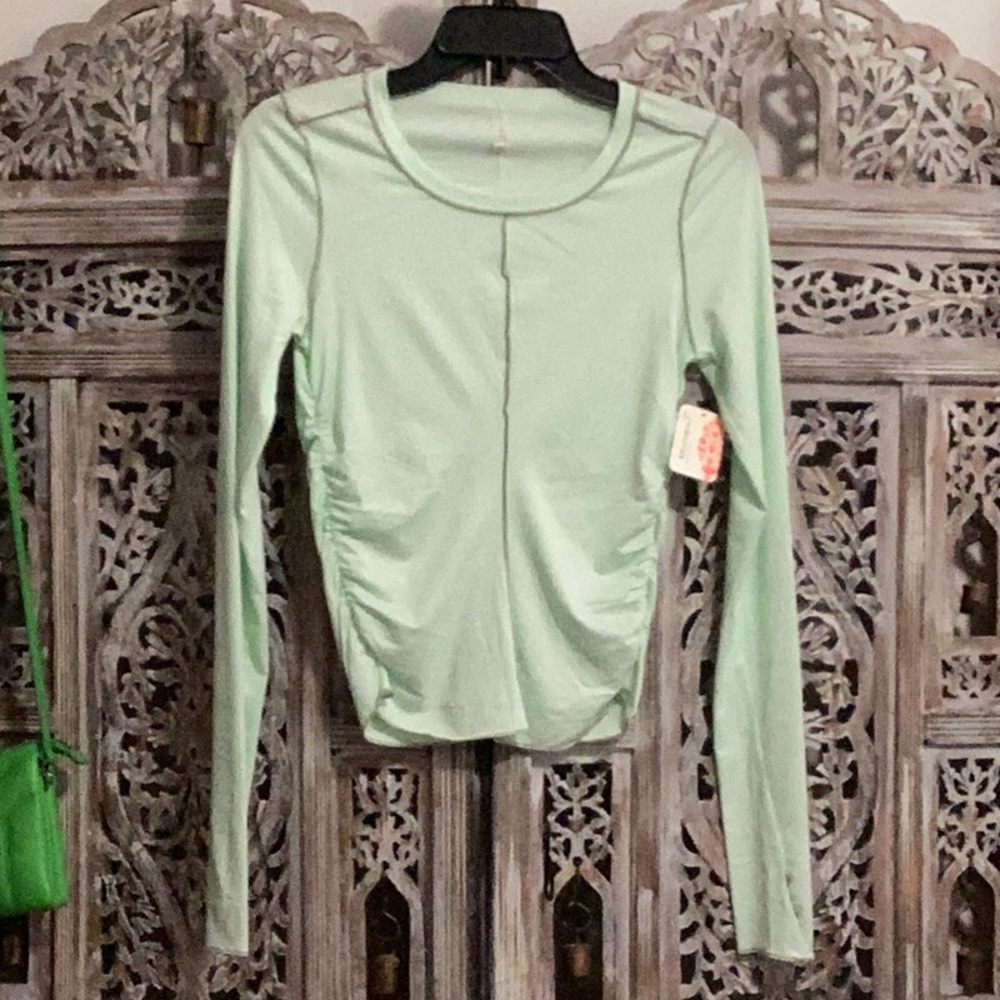 FP MOVEMENT Right On Run Long Sleeve Layer Top Thumbholes NWT Pistachio Green - Picture 5 of 7
